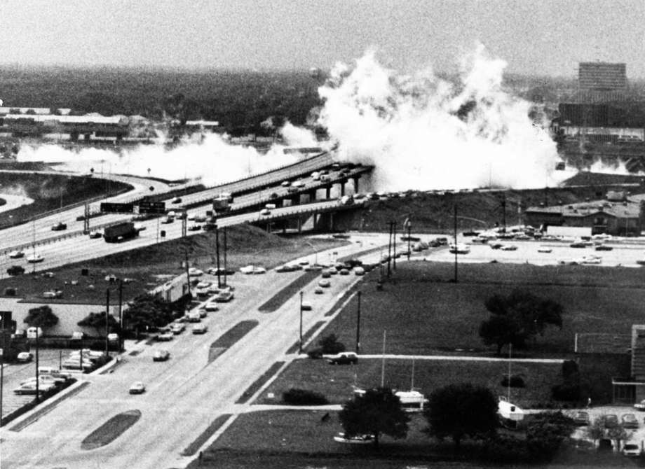 Historic black and white photograph of the 1976 Houston anhydrous ammonia tanker release beside a freeway